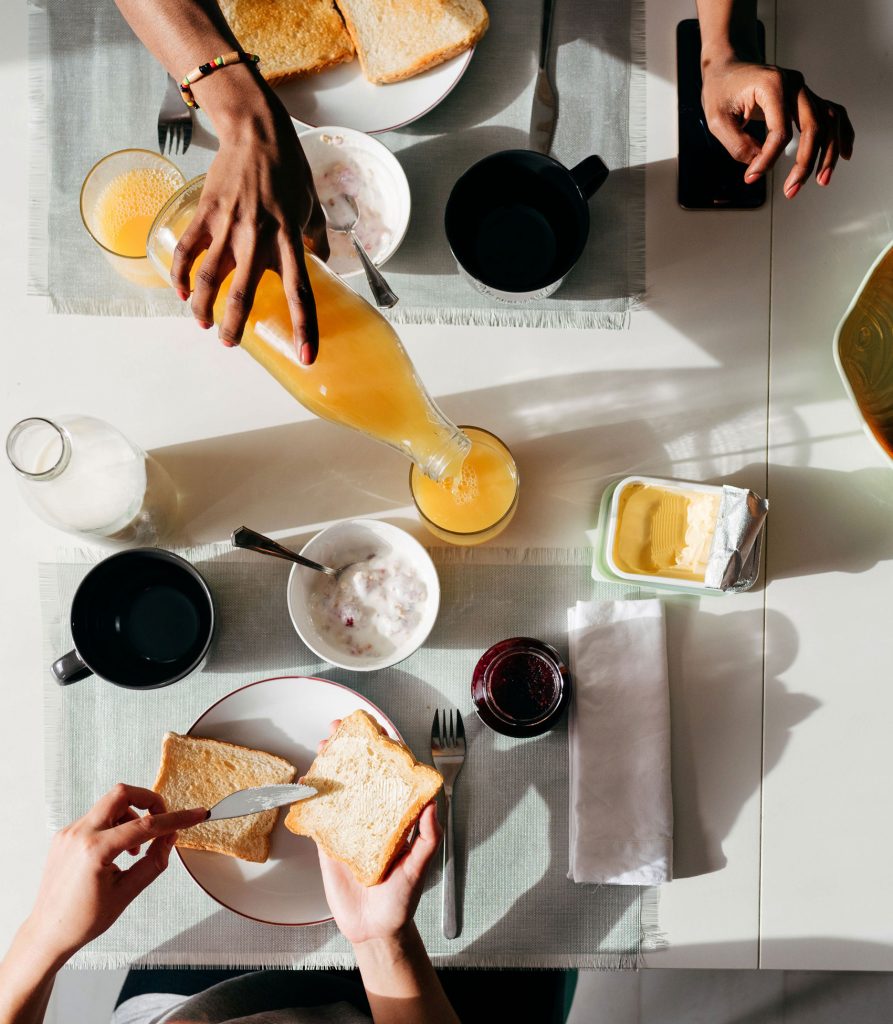 image of a breakfast with orange juice